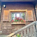 In On Edge Of Woods With River Chalet