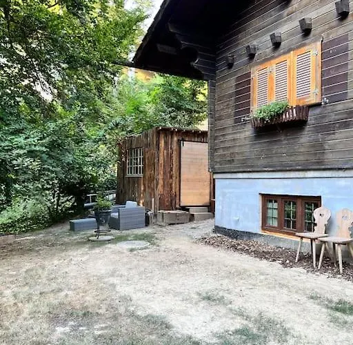 In On Edge Of Woods With River Chalet